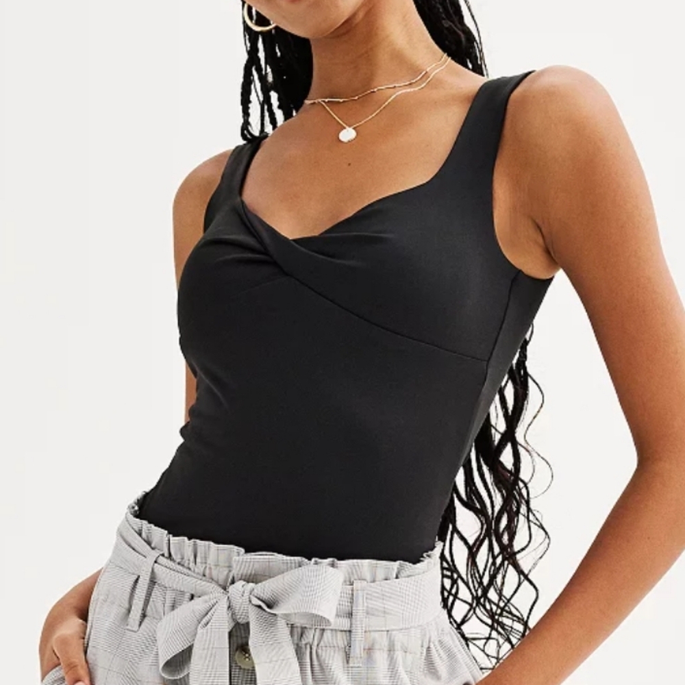 Twist front body suit